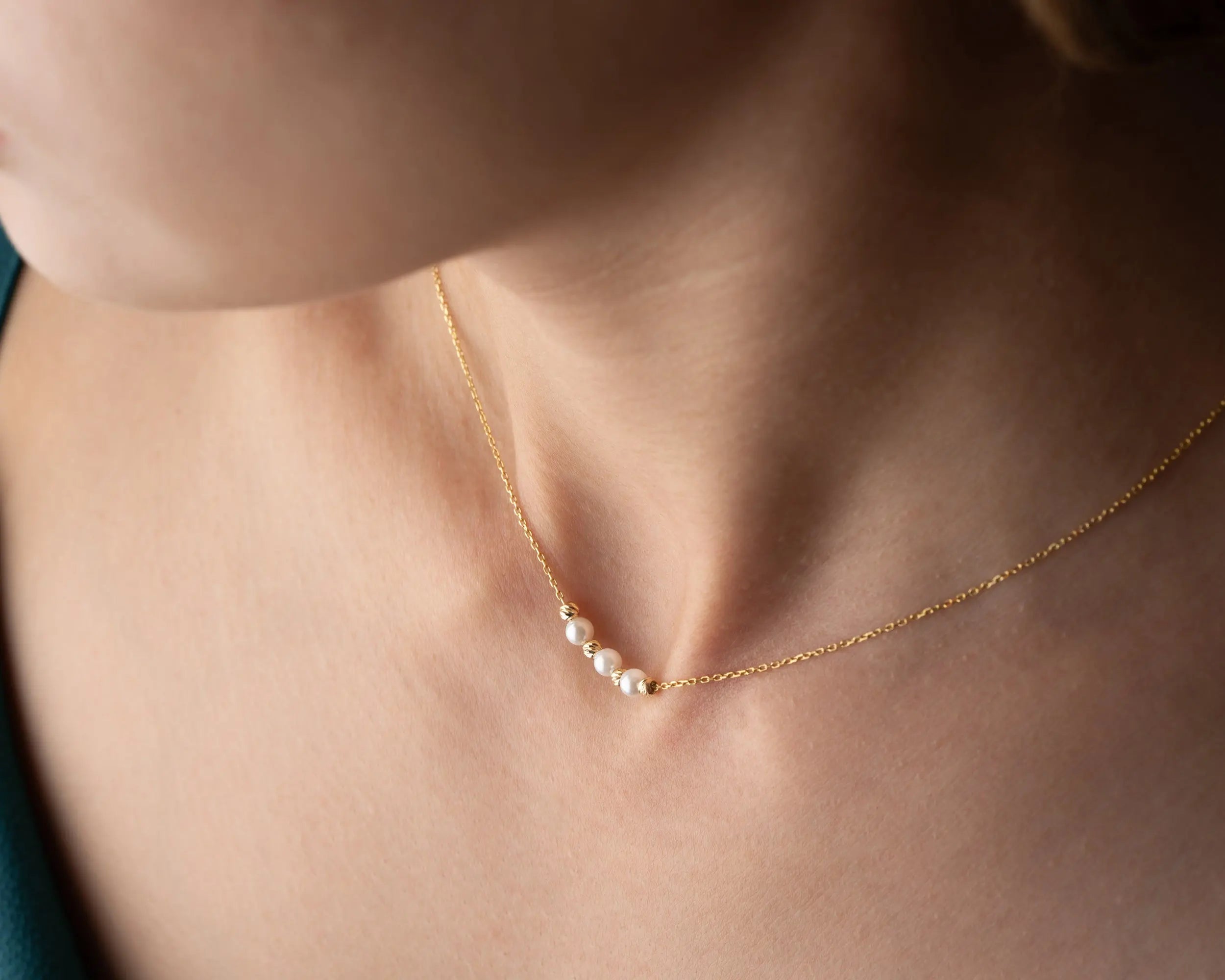 elegant pearl and gold bead necklace